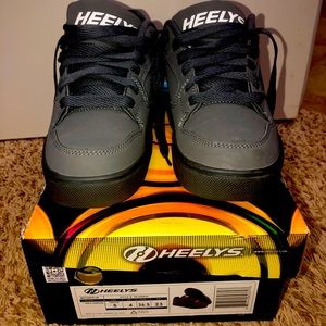 Boys Heeleys charcoal sneakers. Size 5M.